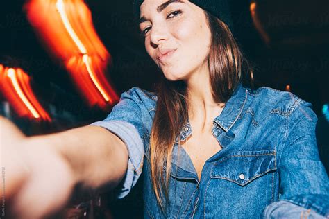 Girl Taking Selfie In Dark Interior By Stocksy Contributor Guille