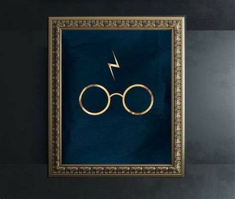 A Framed Harry Potter Symbol With A Lightning Bolt In The Middle On A