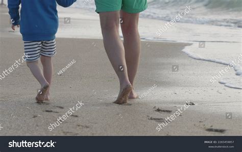 Man Kid Walk Barefoot On Beach Stock Photo 2265459857 | Shutterstock