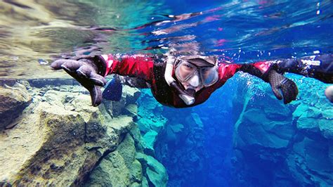 Snorkel Between The Tectonic Plates In Silfra Fissure Hidden Iceland