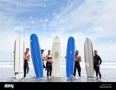 Standing Surfboards Hi Res Stock Photography And Images Alamy