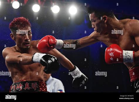 Chinese Boxer Yang Xingxin Right Hits Japanese Boxer Makoto Kawasaki