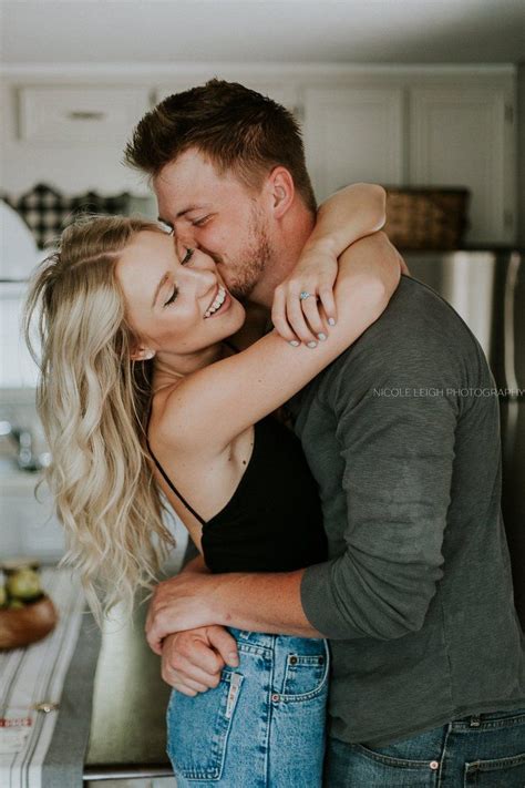 Couple Kiss Engagement Photo Session At Home Nicole Leigh Ostropolec