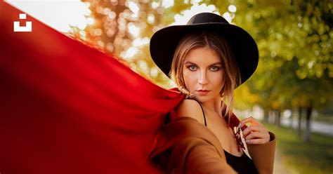 Woman In Red Long Sleeve Shirt Wearing Black Hat Photo Free Россия Image On Unsplash