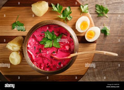 Could Soup On Wooden Plate With Potatoes Stock Photo Alamy