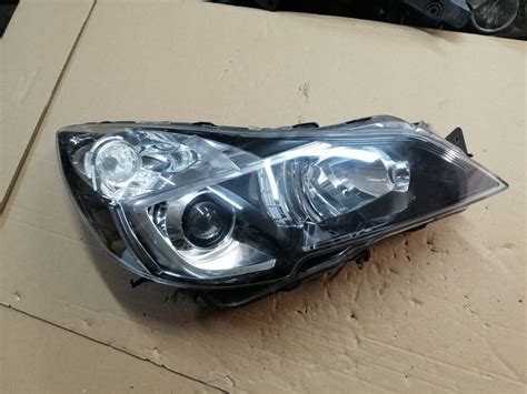 LAMPA PRAWA XENON SUBARU LEGACY V LIFT OUTBACK 84001AJ102 84001AJ182