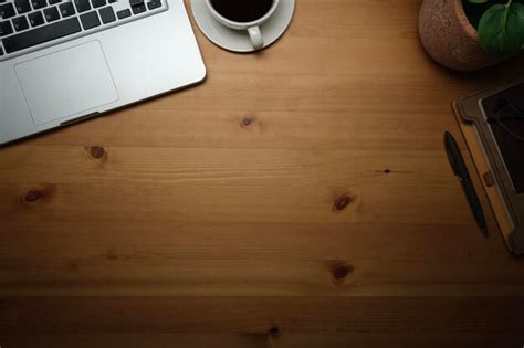 Premium Photo Simple Working Desk With Laptop Computer Coffee Cup