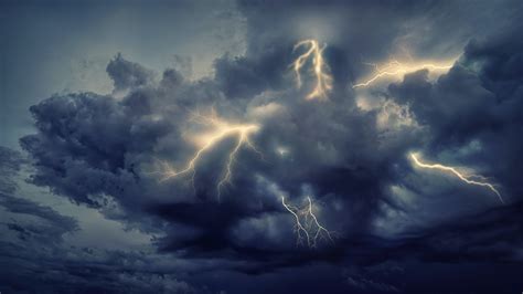 Bright lightnings with rainy clouds over ocean · Free Stock Photo