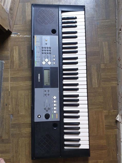 Yamaha Keyboard Psr E233 With Stand And Free Midi Inout To Usb Cable