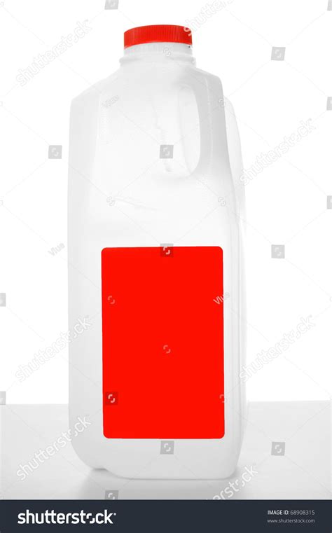 Milk Carton With Red Label On A Shiny Table With White Background 1