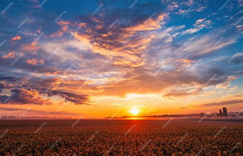 Premium Photo | The dawn sky over the village A wonderful morning landscape