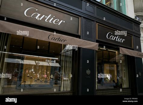 A Logo Sign Outside Of A Cartier Retail Store In Vienna Austria On