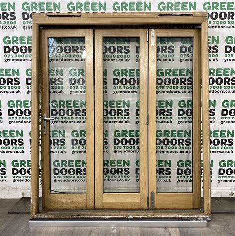 'Super High Quality' Solid Oak Bi-Folding Doors | Green doors