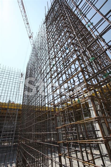 Construction Site With Enforced Concrete Steel Frames Rising Up Stock