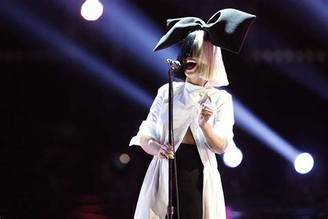 Cheap Thrills Singer Sia Ditches The Iconic Wig To Flash Her Sparkling