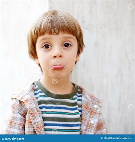 Little boy with funny face stock image. Image of look - 19043385