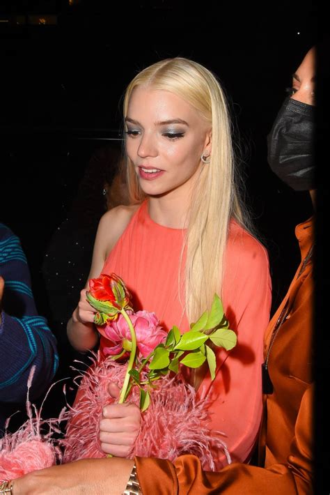 Anya Taylor Joy In Orange Dress Leaving The Rockefeller Center After