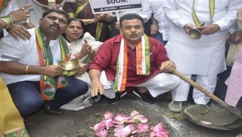 Congress Workers In Mumbai Fill Potholes Accuse Civic Body Of Lack Of