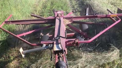 Mowing Tedding And Raking First Cut Grass Hay Youtube