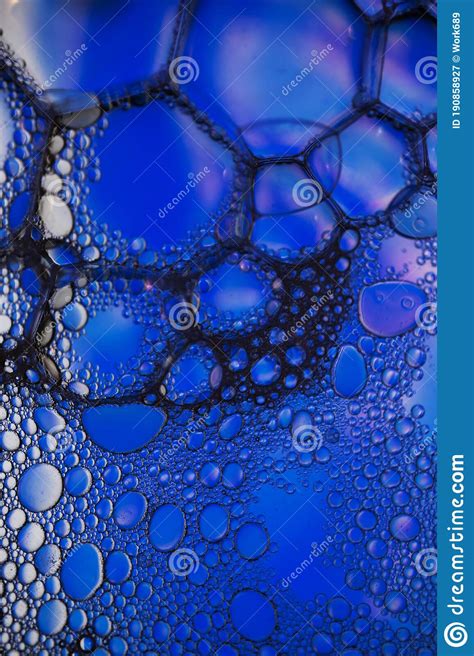 Oil Bubbles In Watercolorful And Blue And Black Colors Together