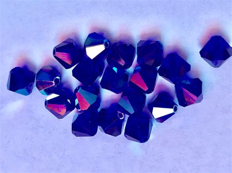 Twelve Beautiful Discontinued Swarovski Crystals Art 5301 Bicones 8 Mm