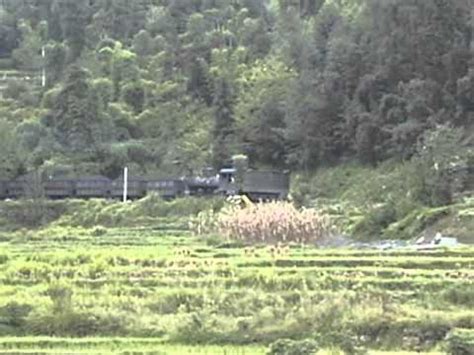 Chinese Steam Shibanxi Railway Loaded Coal Train Races Down Hill Near