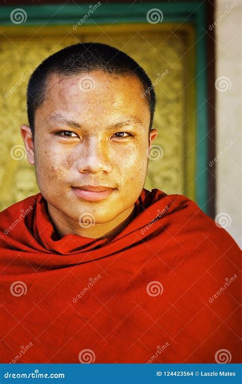 Young Buddhist Monk In Front Of His Monastery At The Northern Part Of