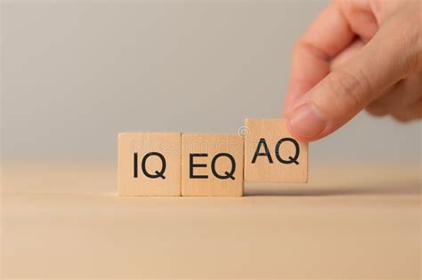Wooden Blocks with the Letters IQ, EQ and AQ Representing Intelligence ... 