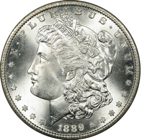 1889 Morgan Silver Dollar (XF to AU condition) - Currency and Coin