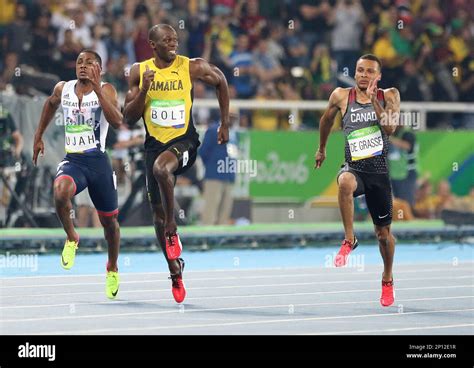 Usain Bolt Looks To The Camera During The 100 Meter Race During The Men