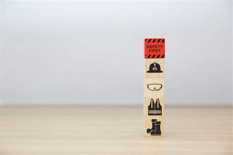 Premium Photo Safety Icons On Wooden Toy Blocks Stacked