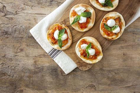 Premium Photo Homemade Mini Pizzas Margarita With Tomato Mozzarella