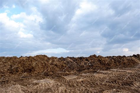 Premium Photo Natural Fertilizer On The Field Manure