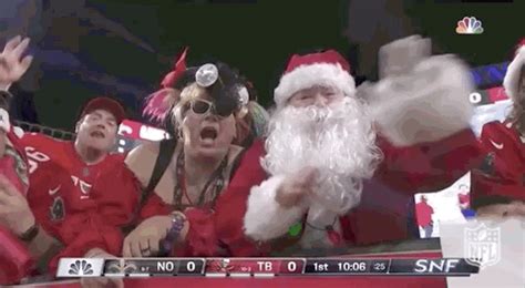 Waving Santa Claus GIF by NFL - Find & Share on GIPHY