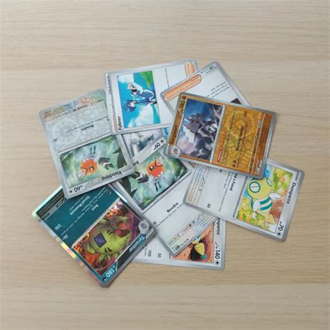 LOT DE CARTES Pokémon JCC Paldea Evolved 9 cartes comprenant des trous