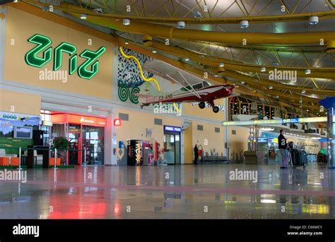 Interior Of Faro Airport With A Light Aircraft Suspended From The