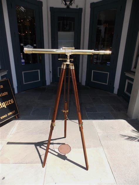 American Walnut Brass Telescope With Level Mounted On Tripod Stand 20th Century At 1stdibs