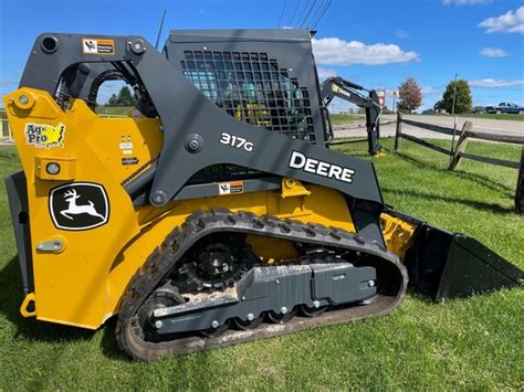 2023 John Deere 317G Compact Track Loaders MachineFinder