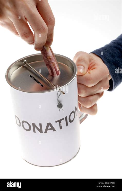 Donation Can Collecting Money For Charity Stock Photo Alamy