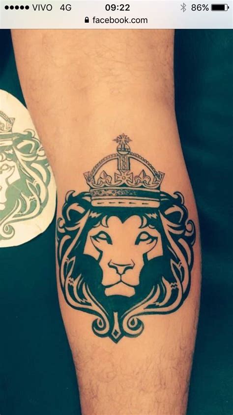 Lion with Crown Tattoo Design