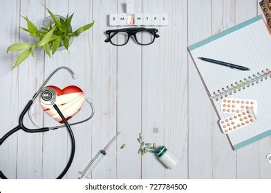 Workplace Doctor Stethoscope Notebook Medical Items Stock Photo