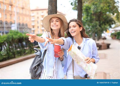 Photo Of Two Girls Enjoying Sightseeing Outdoor Beautiful Female