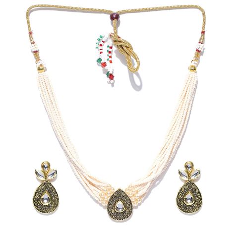 PANASH Gold Toned Off White Kundan Studded Beaded Jewellery Set