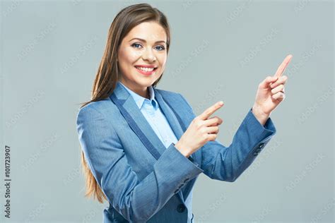 Smiling Business Woman Pointing Finger On Copy Space Stock Photo