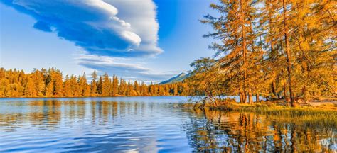 Premium Photo Colorful Autumn Sunrise Clouds Sky Over Lake Panoramic