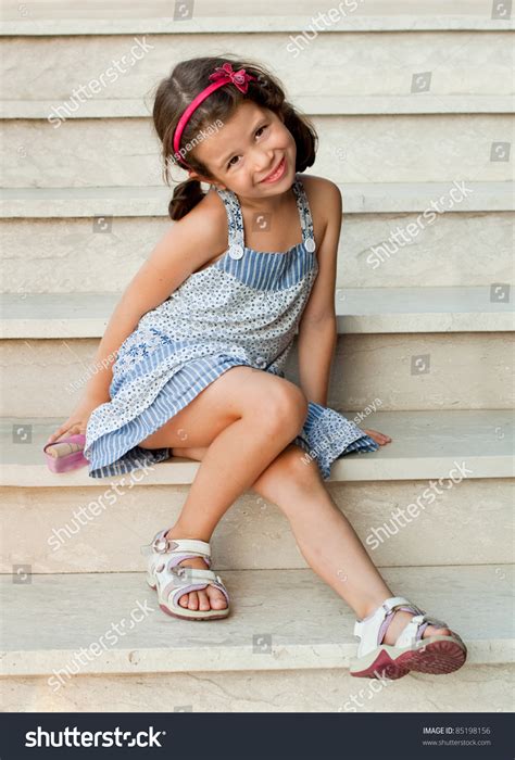 Smiling Girl Summer Dress Sitting On Stock Photo Shutterstock