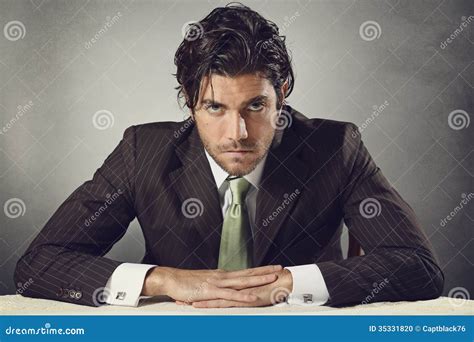 Handsome Businessman With Resolute Eyes Stock Photo Image Of Power