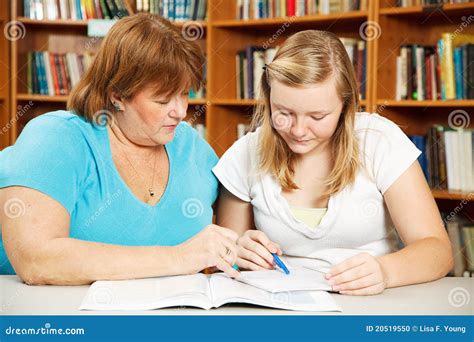 Mother Helps Teen With Homework Stock Photo Image Of Mature Female