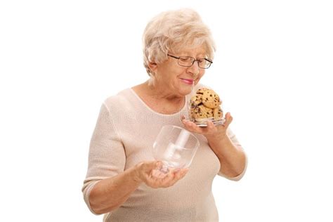 Woman Smelling Cookies In A Jar Stock Photo Image Of Aroma Biscuit