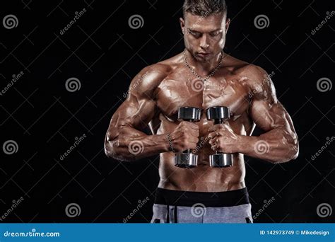 Muscular Fitness Sports Man Atlete With Dumbbell In Fitness Gym